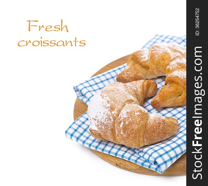 Fresh Croissants On A Wooden Board, Isolated