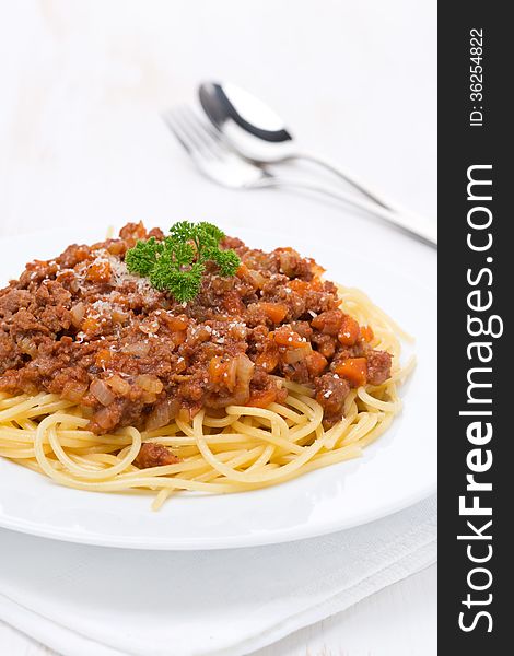 Portion Of Spaghetti Bolognese On A White Plate, Vertical