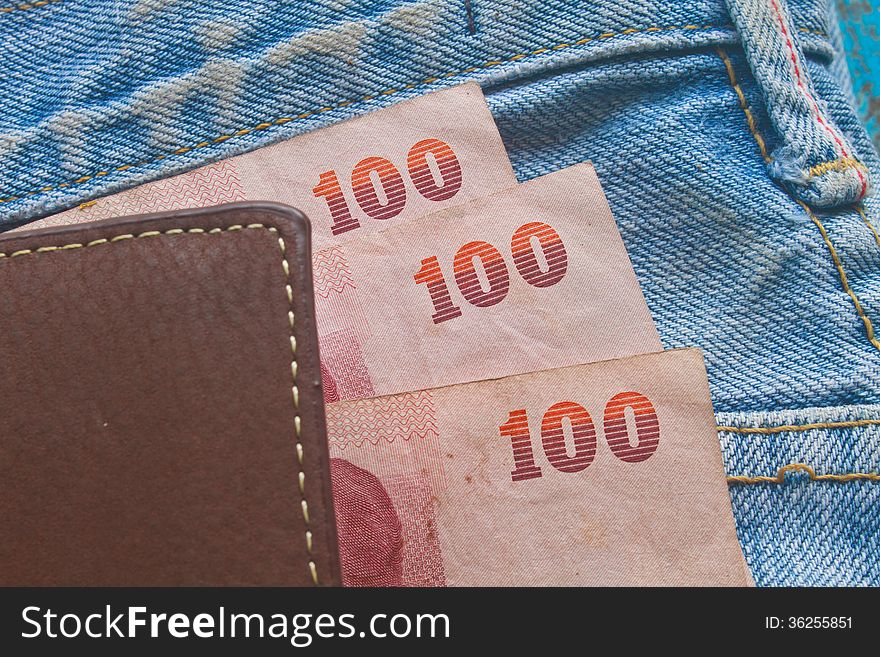 Banknote in a jeans pocket, close up texture. Banknote in a jeans pocket, close up texture