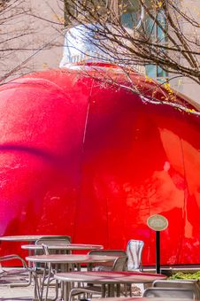 Giant Red Bauble On City Plaza Stock Images