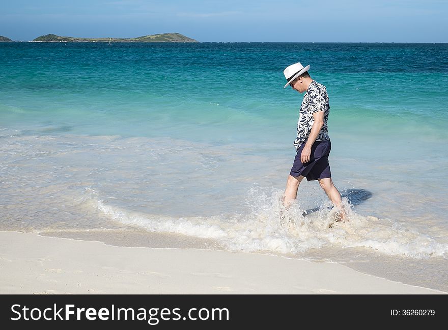 Man Walking on Orient Beach Saint Martin 2. Man Walking on Orient Beach Saint Martin 2