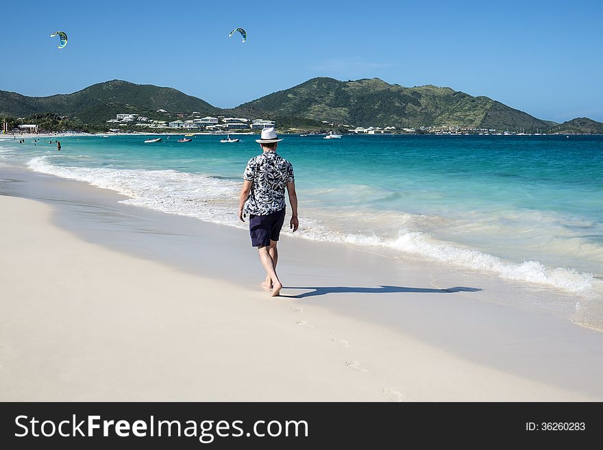 Man Walking On A Caribbean Beach 3