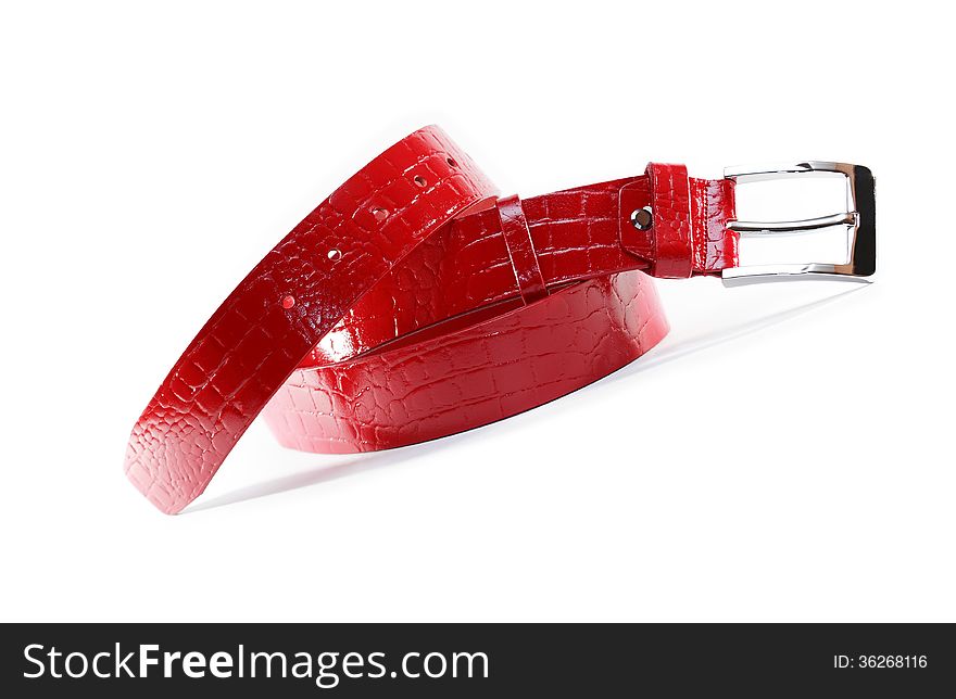 New stylish red leather belt on white background
