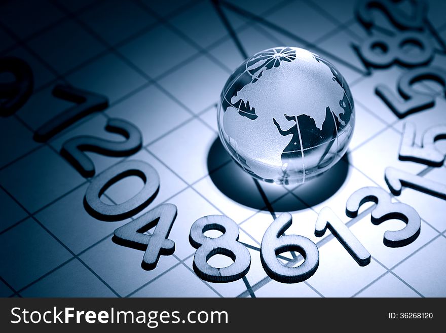 Business concept. Glass globe on background with diagram and numbers. Business concept. Glass globe on background with diagram and numbers