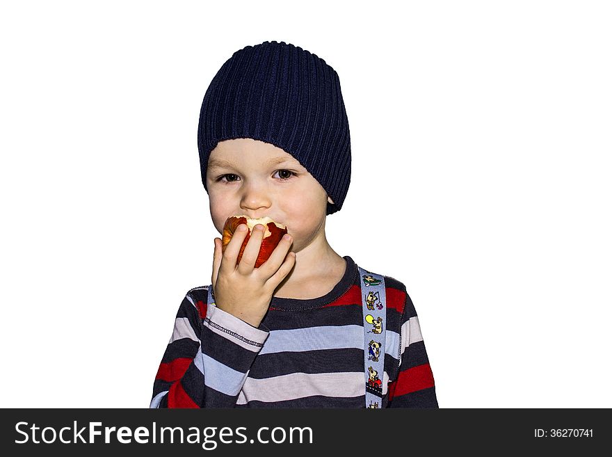 Child with appetite eats red apple. Child with appetite eats red apple