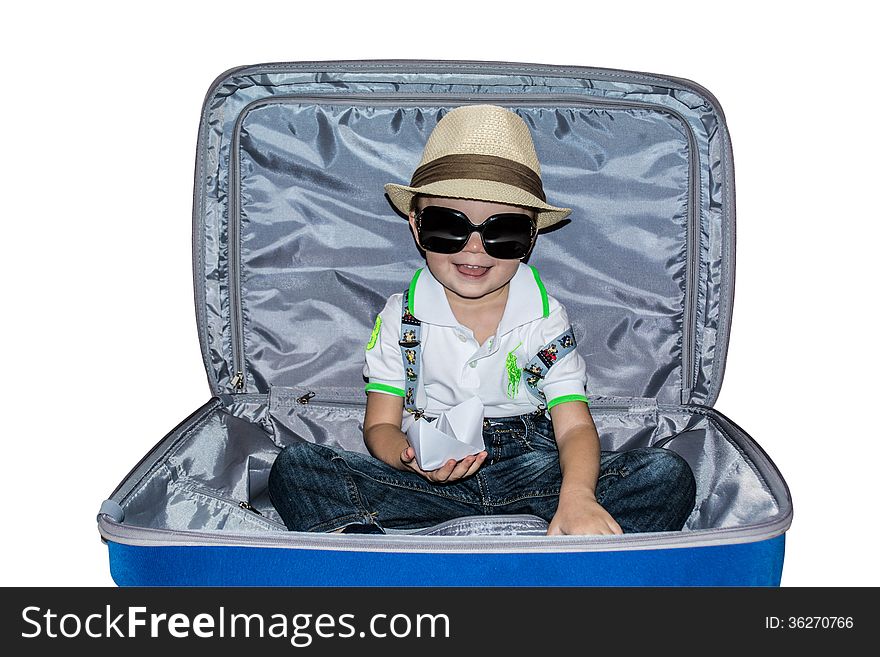 Abstraction, holiday by the sea, a child with a paper boat in a suitcase