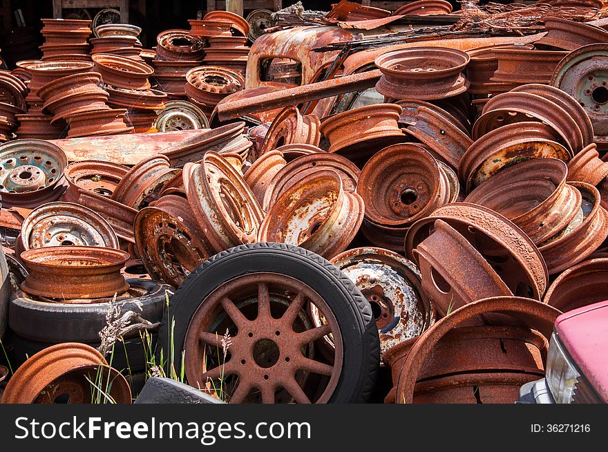 Piles of rusty wheels found in car wreckers