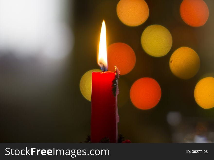 Candle Flame With Bokeh Christmas Tree Lights