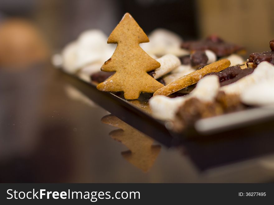 Tree Gingerbread on reflection with glass table