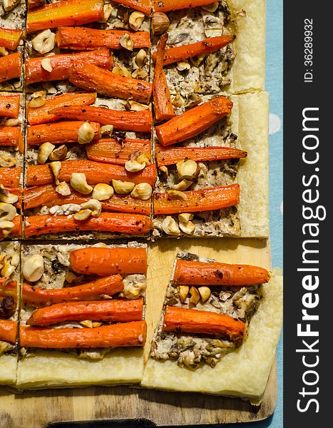 Vegetarian tart with carrots and hazelnuts