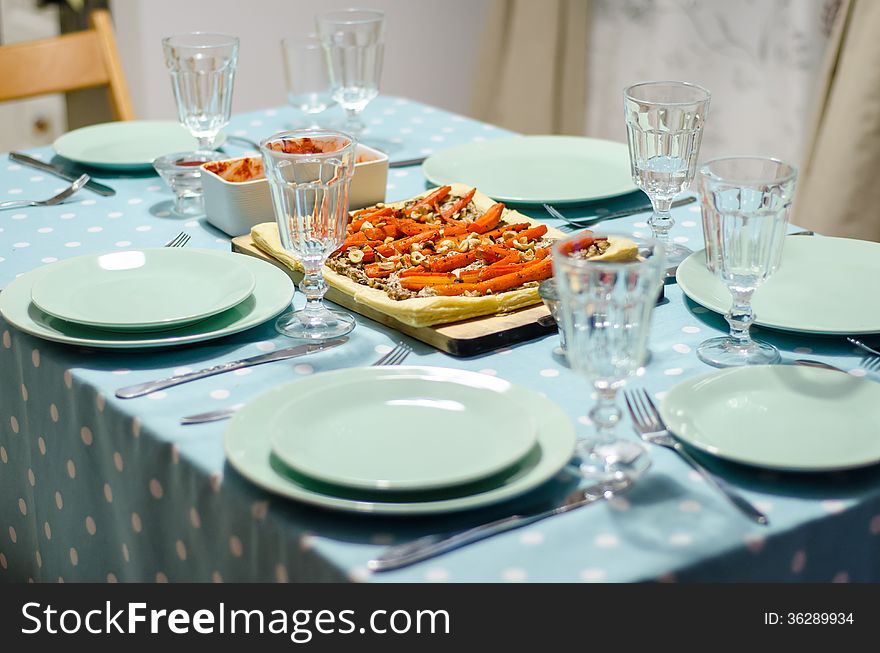 Christmas table with tableware and food. Christmas table with tableware and food