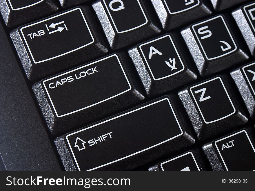 Black computer keyboard with white letters