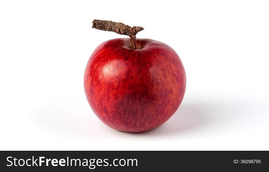 Red apple being eaten - core and a rough stem are left