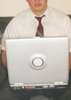 Young Man Typing On Laptop Royalty Free Stock Photos Young Man Typing On Laptop Royalty Free Stock Photos