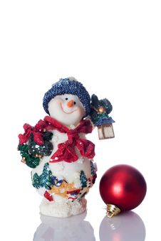 Snowman And Red Christmas Ball Royalty Free Stock Image Snowman And Red Christmas Ball Royalty Free Stock Image
