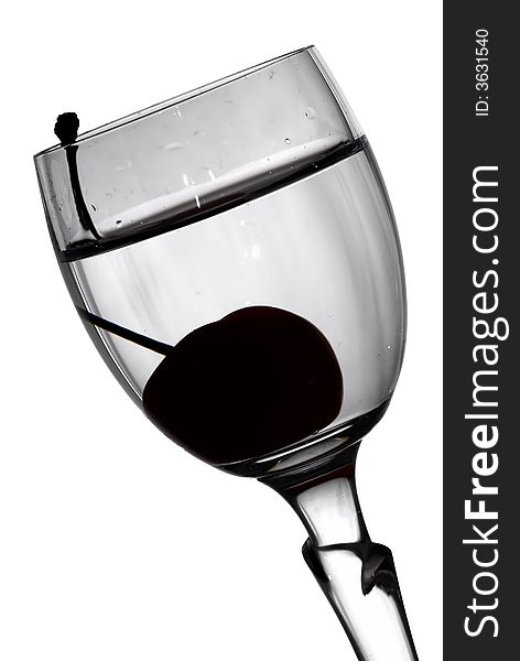 Cherry in glass black-and-white photo  (isolated with clipping path). Cherry in glass black-and-white photo  (isolated with clipping path)