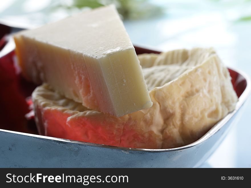 Close-up of Parmesan and Camembert cheese