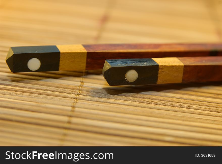 Chopstick on a bamboo mat