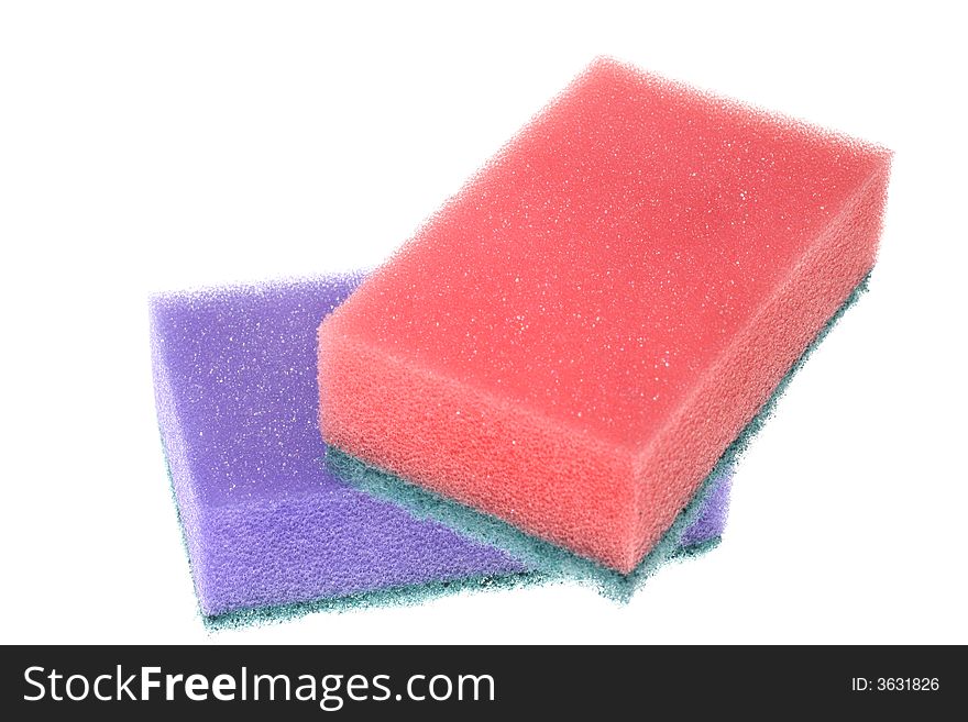 Two sponges isolated on a white background