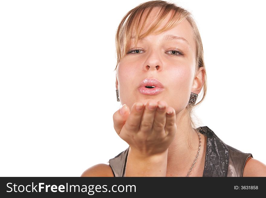 Pretty girl blowing kisses isolated over white background