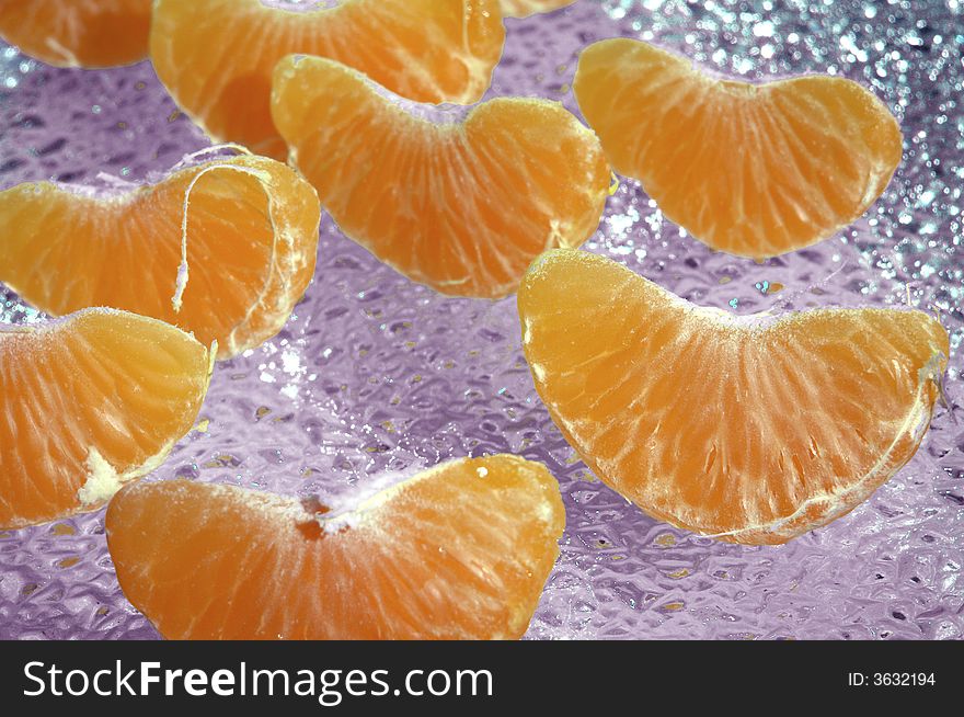 Tangerine on a violet background