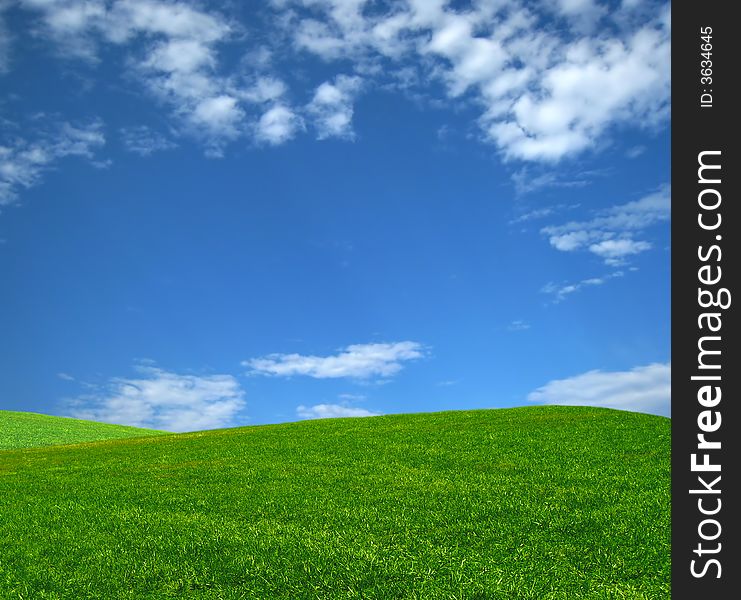 Grass Hill with bright blue sky, a great spring day. Grass Hill with bright blue sky, a great spring day