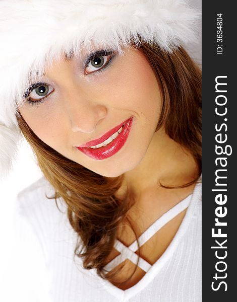 Winter portrait of a beautiful young smiling woman. Winter portrait of a beautiful young smiling woman