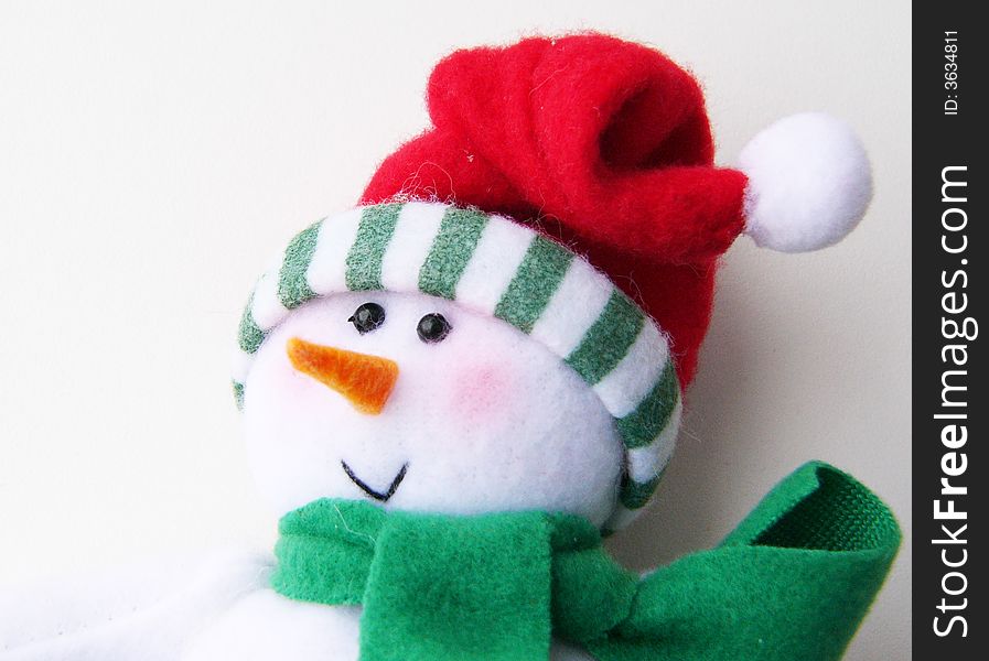 Detail of little snowman. Christmas decoration. Winter small figure.