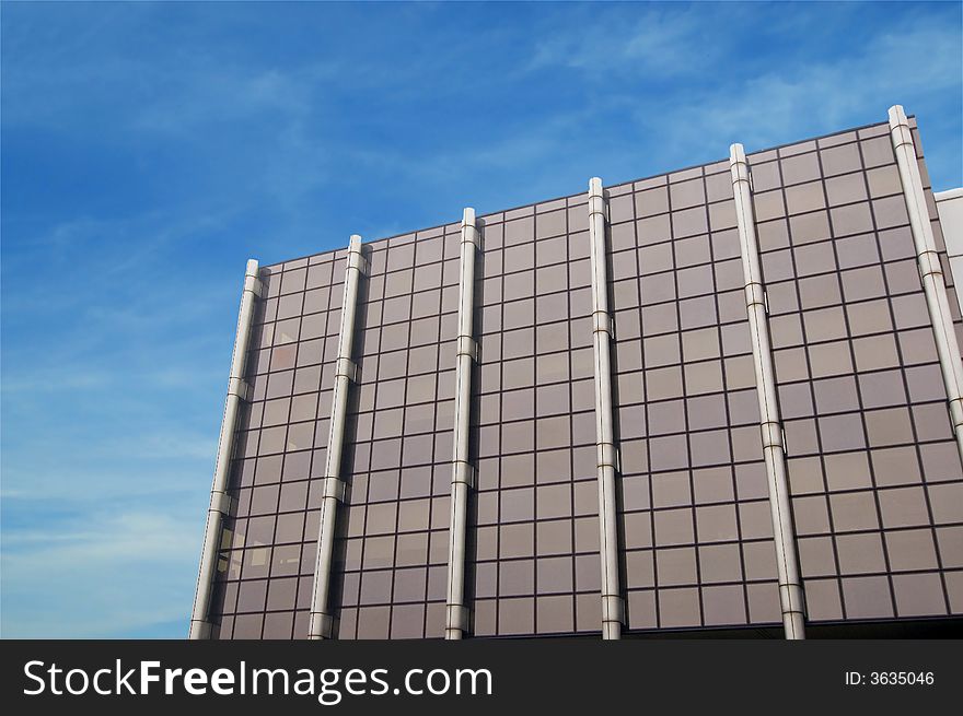 Office building blue sky background. Office building blue sky background