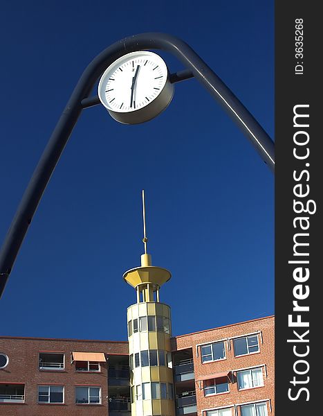 Architectural detail - bus station time indicator embedded in themodern architecture. Architectural detail - bus station time indicator embedded in themodern architecture