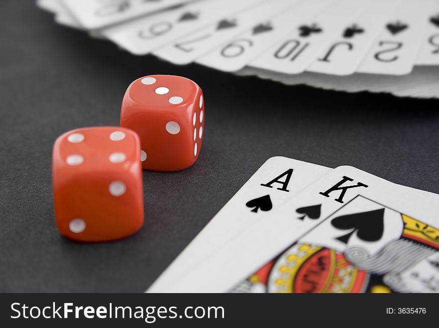 Playing Cards & Dice on Black Surface. Playing Cards & Dice on Black Surface