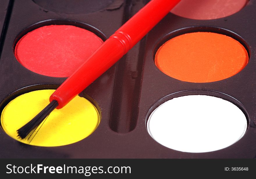 A watercolour paint set, photographed in a studio. A watercolour paint set, photographed in a studio.