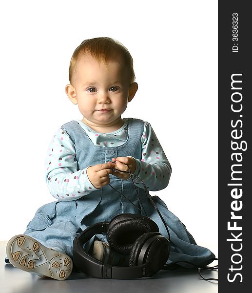 The girl with headphones on a white background