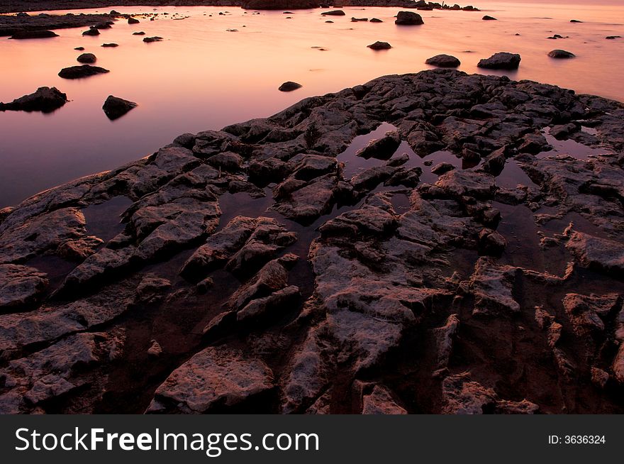 Rocks And Shallow Water