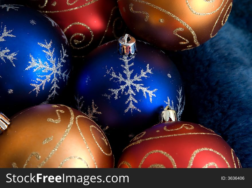 Colorful christmas balls on fur