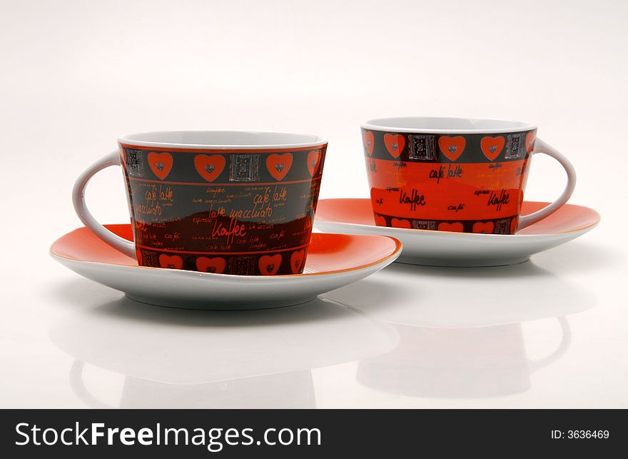 Red cups on a white background isolated