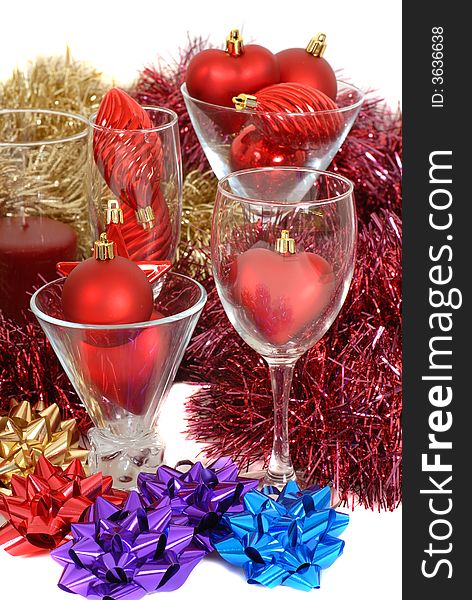 Christmas ornaments and decorations in and around glassware