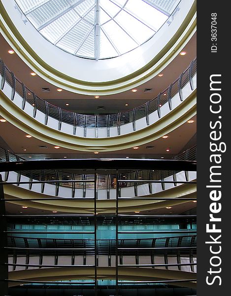 Interior view of modern building with elliptical shaped skylight as roof