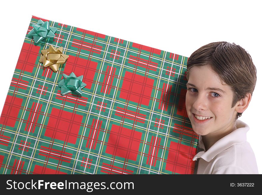 Young boy holding BIG present