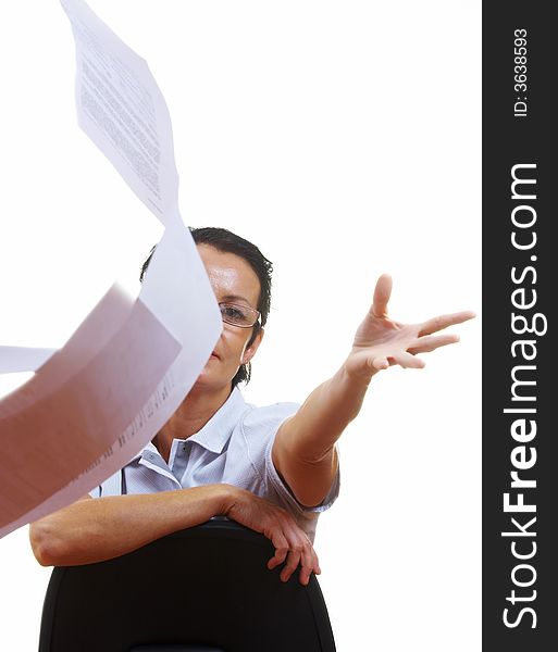 Portrait of businesswoman  casting her papers away emotionally. Portrait of businesswoman  casting her papers away emotionally