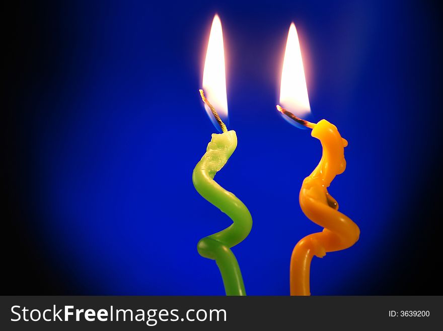 Candle on a dark blue background