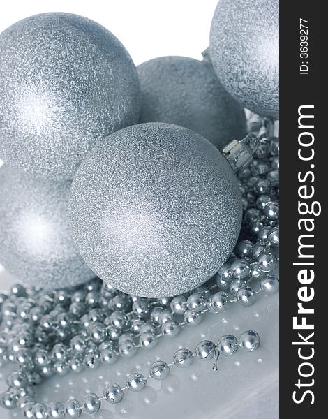 Silver christmas balls and pearl