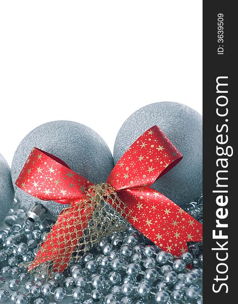 Silver christmas balls and red ribbon