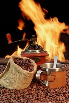 Stainless Steel Coffee Mug And Old Grinder With Beans Stock Photography Stainless Steel Coffee Mug And Old Grinder With Beans Stock Photography