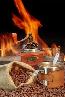 Stainless Steel Coffee Mug And Old Grinder With Beans Royalty Free Stock Photos Stainless Steel Coffee Mug And Old Grinder With Beans Royalty Free Stock Photos