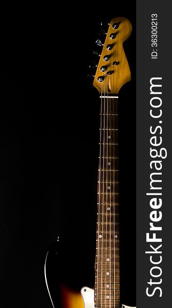 Electric guitar on black background. Electric guitar on black background.
