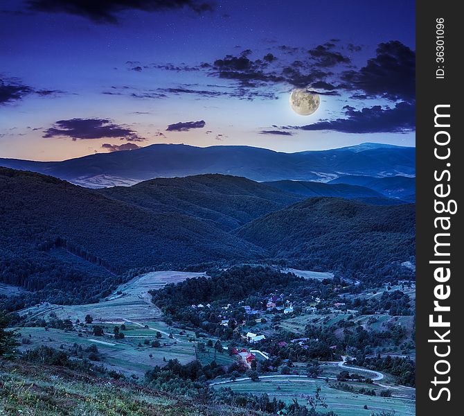 Moon Light Falls On Hillside With Autumn Forest In Mountain