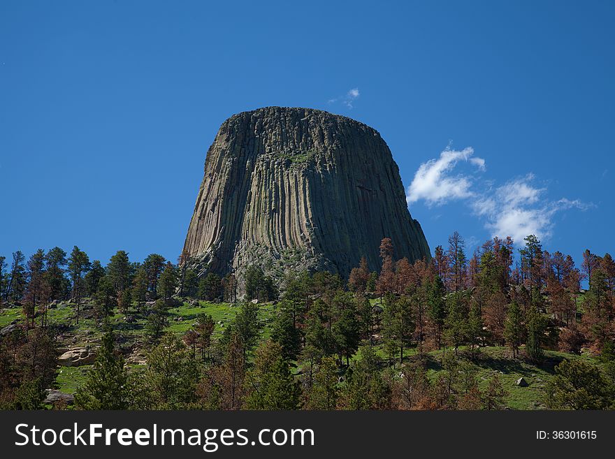 Devil's Tower rising up against the Wyoming sky. Devil's Tower rising up against the Wyoming sky.