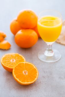 Squeezing A Glass Of Fresh Orange Juice Royalty Free Stock Image Squeezing A Glass Of Fresh Orange Juice Royalty Free Stock Image