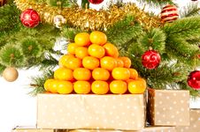 Christmas Tree With Gifts And Mandarines Royalty Free Stock Image Christmas Tree With Gifts And Mandarines Royalty Free Stock Image